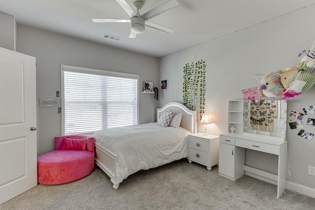 bedroom featuring light colored carpet and ceiling fan