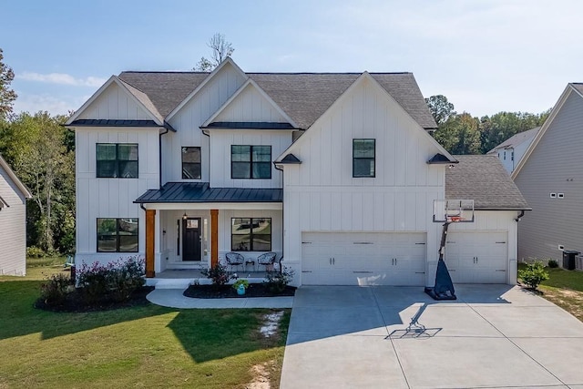 modern inspired farmhouse featuring a porch, a garage, a front yard, and central air condition unit