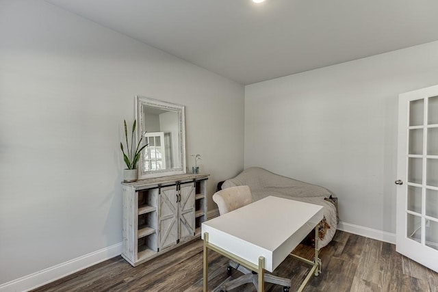 bedroom featuring dark wood-type flooring