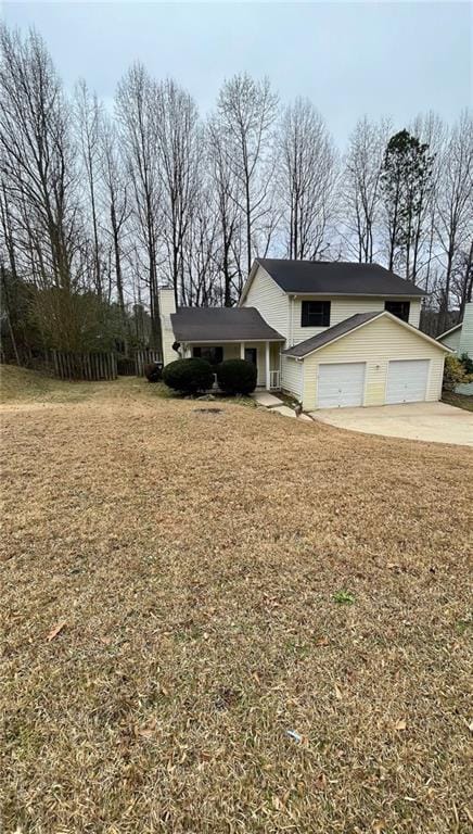 view of front of home with a garage