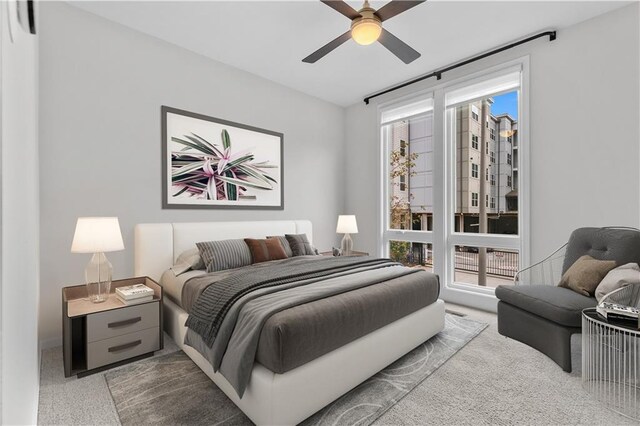 carpeted bedroom featuring ceiling fan