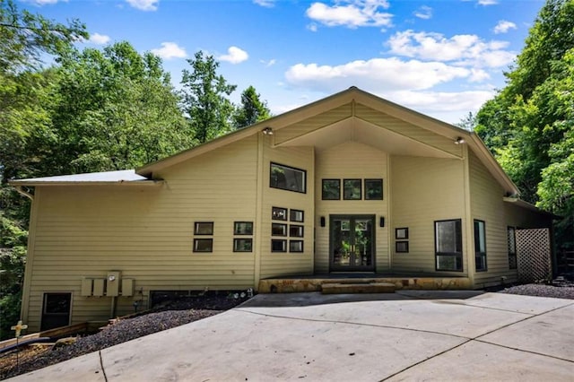 10323 Grassy Mountain Rd, Ellijay, GA 30540 - back of house featuring french doors and driveway