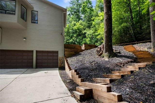 10323 Grassy Mountain Rd, Ellijay, GA 30540 - view of home's exterior with a garage and driveway