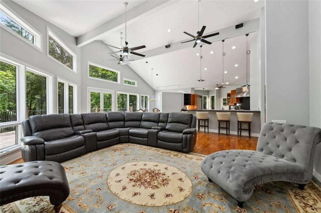 10323 Grassy Mountain Rd, Ellijay, GA 30540 - living room featuring high vaulted ceiling, wood finished floors, beam ceiling, a ceiling fan, and recessed lighting