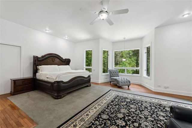 10323 Grassy Mountain Rd, Ellijay, GA 30540 - bedroom featuring wood finished floors and ceiling fan