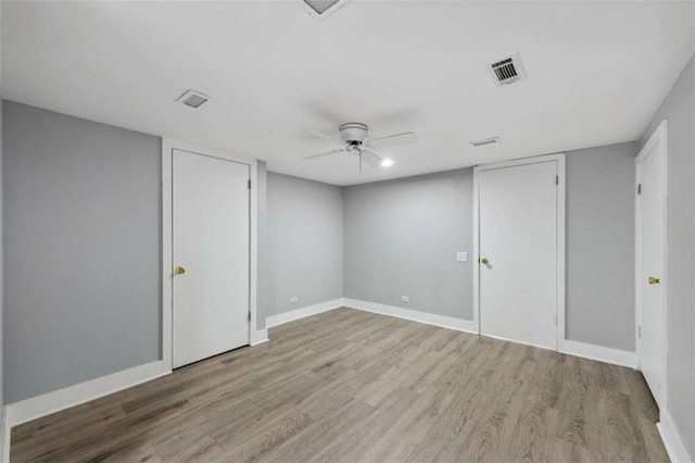 10323 Grassy Mountain Rd, Ellijay, GA 30540 - unfurnished bedroom featuring wood finished floors and a ceiling fan