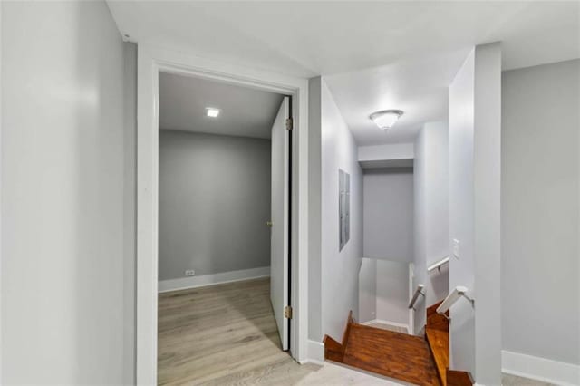 10323 Grassy Mountain Rd, Ellijay, GA 30540 - corridor featuring an upstairs landing and wood finished floors