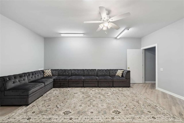 10323 Grassy Mountain Rd, Ellijay, GA 30540 - unfurnished living room featuring wood finished floors and ceiling fan
