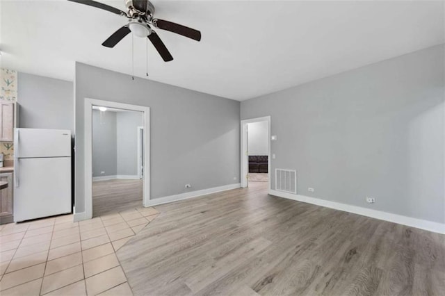 10323 Grassy Mountain Rd, Ellijay, GA 30540 - unfurnished living room with ceiling fan and light wood-style flooring