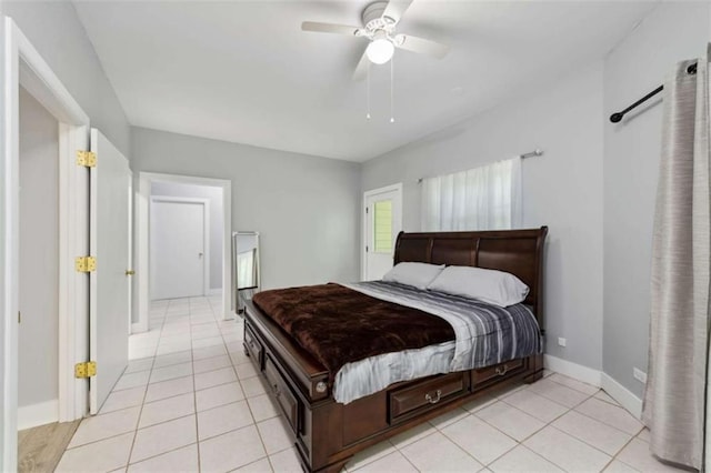 10323 Grassy Mountain Rd, Ellijay, GA 30540 - bedroom with light tile patterned floors and ceiling fan