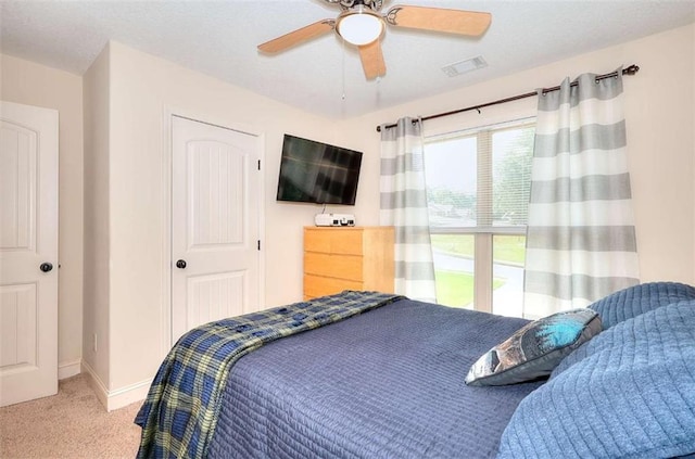 340 Thoroughbred Trl, Monroe, GA 30655 - carpeted bedroom with baseboards and a ceiling fan