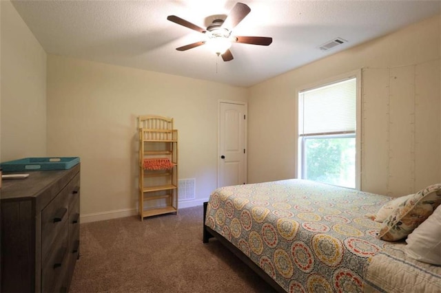 340 Thoroughbred Trl, Monroe, GA 30655 - carpeted bedroom featuring a ceiling fan and baseboards