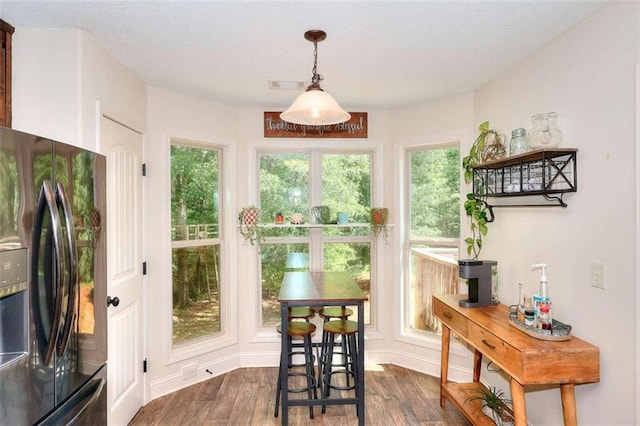 340 Thoroughbred Trl, Monroe, GA 30655 - dining room featuring dark wood-style flooring and healthy amount of natural light
