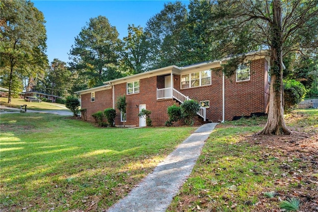 view of front of home with a front lawn