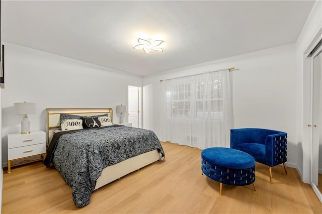 bedroom with wood-type flooring