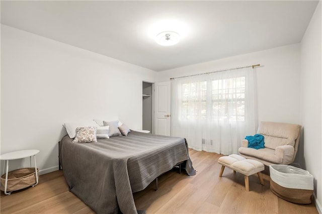 bedroom featuring light hardwood / wood-style floors