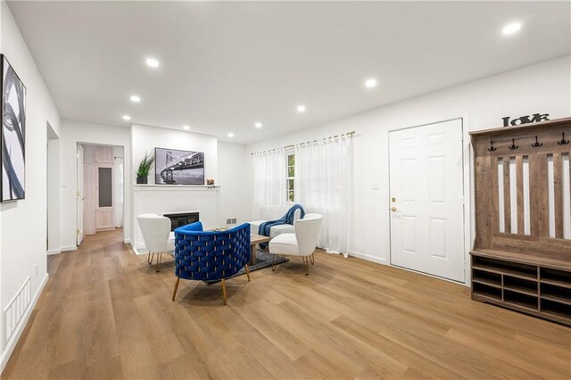 sitting room featuring light wood-type flooring