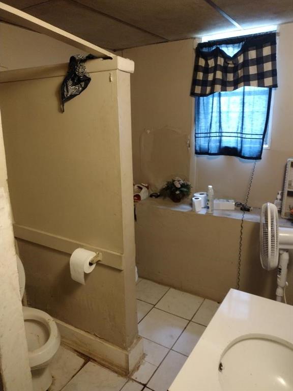 1005 Ashby Ter, Atlanta, GA 30314 - bathroom with tile patterned flooring, toilet, and sink