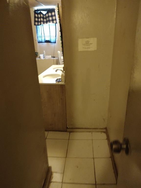1005 Ashby Ter, Atlanta, GA 30314 - bathroom featuring tile patterned flooring and sink