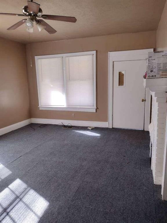 1005 Ashby Ter, Atlanta, GA 30314 - carpeted empty room with ceiling fan