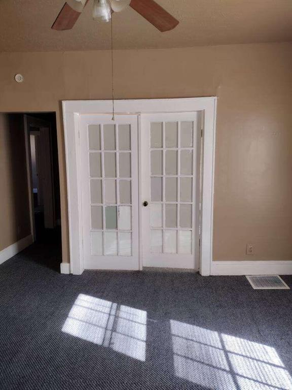1005 Ashby Ter, Atlanta, GA 30314 - carpeted spare room with french doors