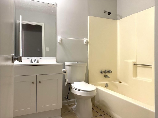 full bathroom featuring tile patterned flooring, vanity,  shower combination, and toilet