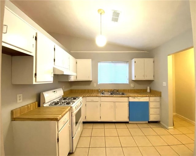 kitchen with light tile patterned floors, white appliances, white cabinetry, and lofted ceiling