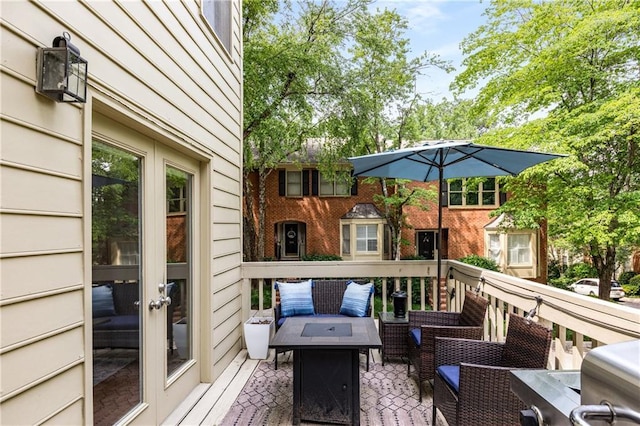 1341 Sheffield Glen Way NE, Atlanta, GA 30329 - wooden terrace featuring an outdoor living space with a fire pit