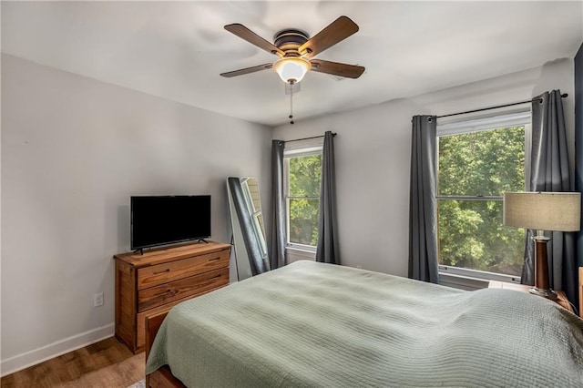 1341 Sheffield Glen Way NE, Atlanta, GA 30329 - bedroom featuring wood finished floors, baseboards, and a ceiling fan