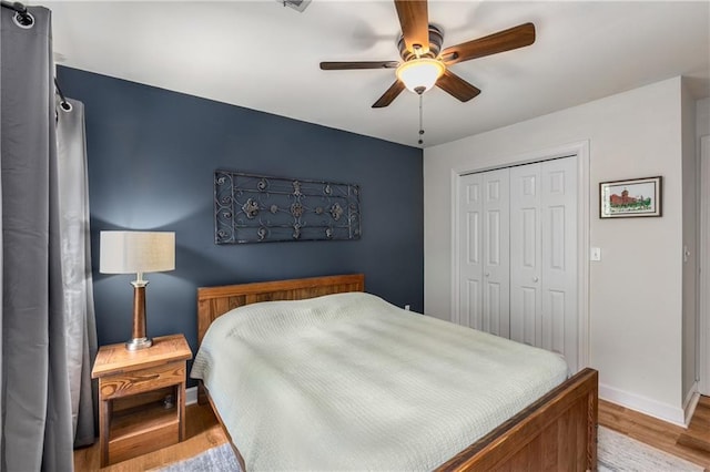 1341 Sheffield Glen Way NE, Atlanta, GA 30329 - bedroom with wood finished floors, a closet, baseboards, and ceiling fan
