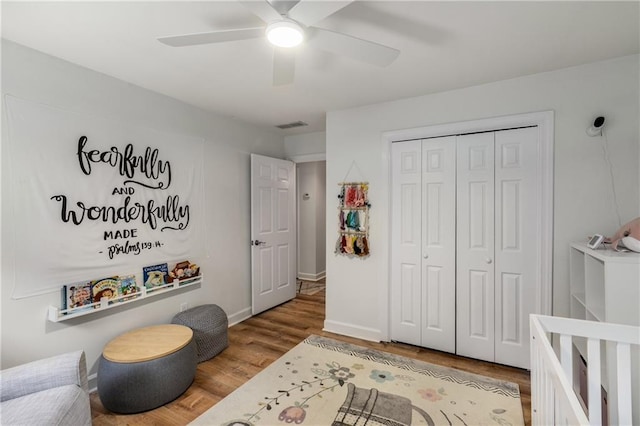1341 Sheffield Glen Way NE, Atlanta, GA 30329 - bedroom featuring wood finished floors, a closet, ceiling fan, and baseboards