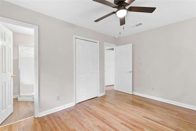 6671 Gano Dr, Riverdale, GA 30274 - unfurnished bedroom with light wood-type flooring, a closet, ensuite bathroom, and ceiling fan