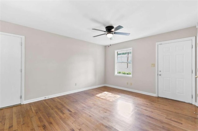 6671 Gano Dr, Riverdale, GA 30274 - spare room with a ceiling fan and wood finished floors