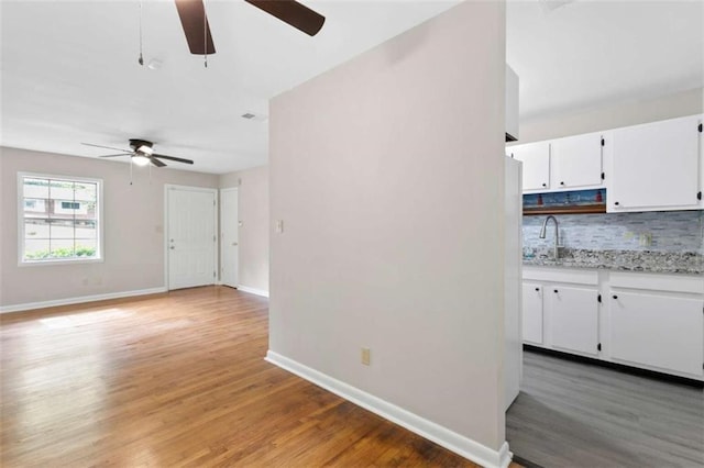 6671 Gano Dr, Riverdale, GA 30274 - spare room with a ceiling fan and light wood-type flooring