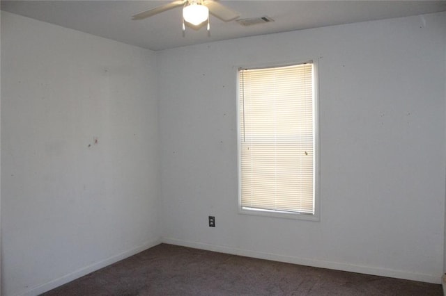 carpeted empty room with ceiling fan