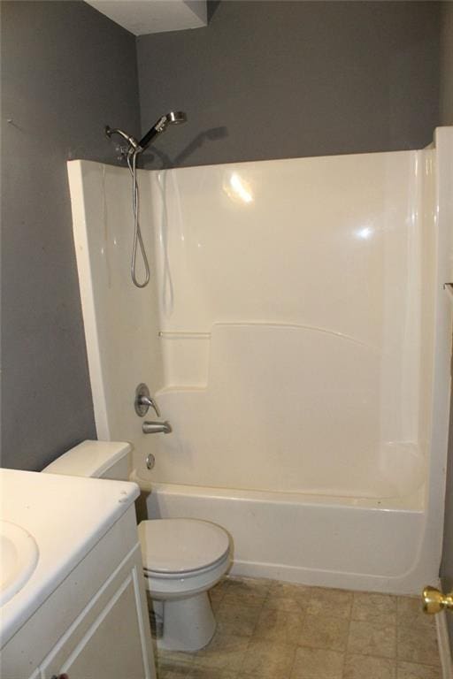 full bathroom featuring vanity, shower / tub combination, and toilet