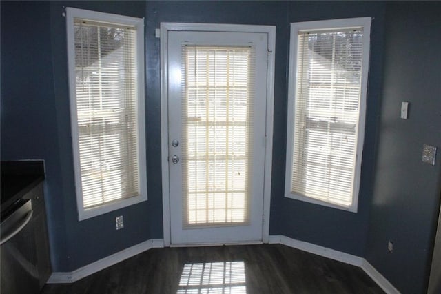 doorway featuring dark wood-type flooring