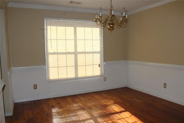 unfurnished room with ornamental molding, dark hardwood / wood-style flooring, and a notable chandelier