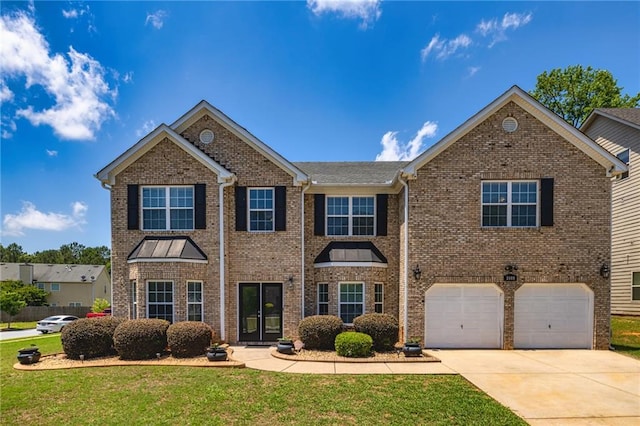 2689 Muskeg Ct SW, Atlanta, GA 30331 - view of front of house featuring concrete driveway, brick siding, a front yard, and a garage