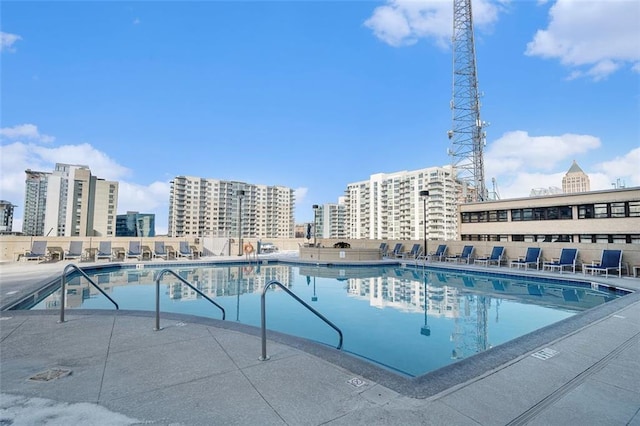 view of swimming pool with a patio area