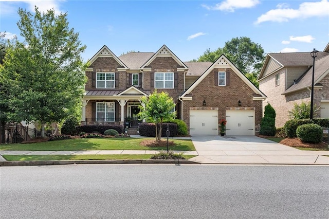 2680 Augeron Ct, Alpharetta, GA 30004 - craftsman-style home featuring concrete driveway, brick siding, a front yard, a garage, and a standing seam roof