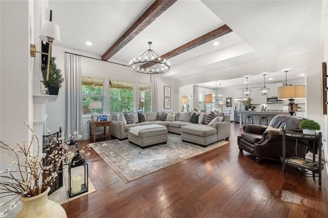 2680 Augeron Ct, Alpharetta, GA 30004 - living area with a chandelier, beam ceiling, and hardwood / wood-style floors