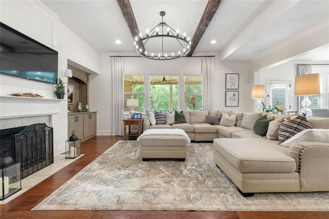 2680 Augeron Ct, Alpharetta, GA 30004 - living area with a chandelier, beamed ceiling, dark wood-style flooring, plenty of natural light, and recessed lighting