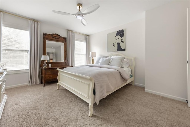 2680 Augeron Ct, Alpharetta, GA 30004 - bedroom with light colored carpet, multiple windows, baseboards, and ceiling fan