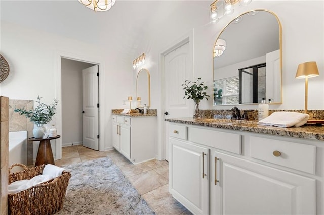 2680 Augeron Ct, Alpharetta, GA 30004 - full bath with two vanities, a garden tub, and a shower with shower door