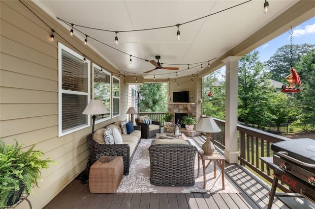 2680 Augeron Ct, Alpharetta, GA 30004 - wooden terrace with an outdoor living space with a fireplace, grilling area, and ceiling fan