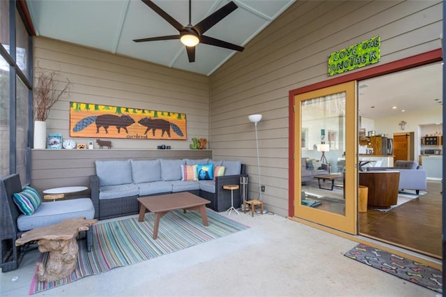 exterior space with outdoor lounge area and a ceiling fan