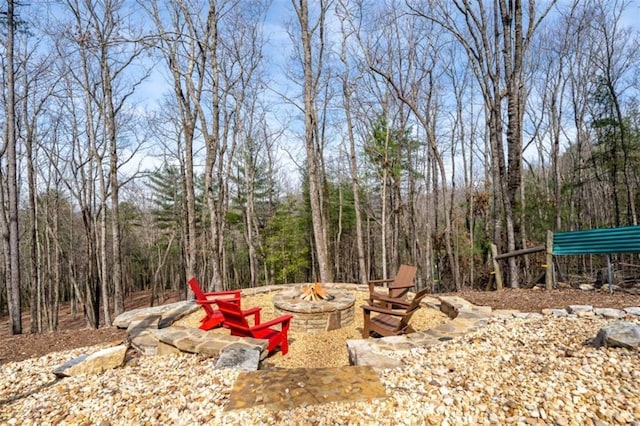 view of yard featuring a fire pit
