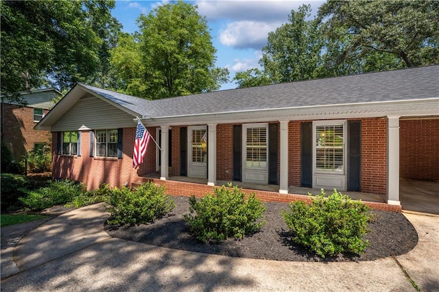 650 Crestview Ter, Gainesville, GA 30501 - ranch-style home featuring covered porch, brick siding, and roof with shingles
