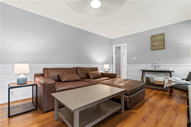 650 Crestview Ter, Gainesville, GA 30501 - living room featuring ceiling fan, wainscoting, and wood finished floors